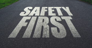 Safety first, message on the road. Concept of safe driving and preventing traffic accident.