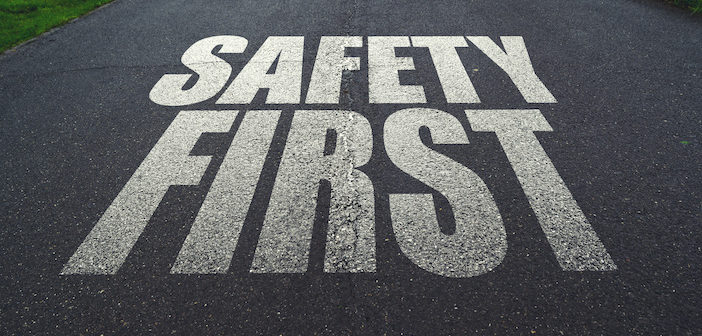 Safety first, message on the road. Concept of safe driving and preventing traffic accident.