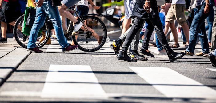 People on pedestrian crossings, on foot and by bicycle