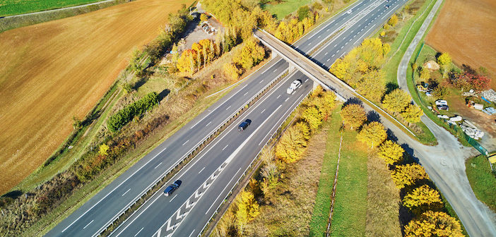 Aerial drone view of beautiful French countryside and motorway in France