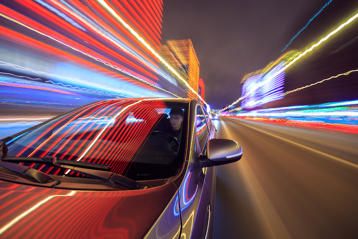 blurred urban look of the car movement winter nights longexposure